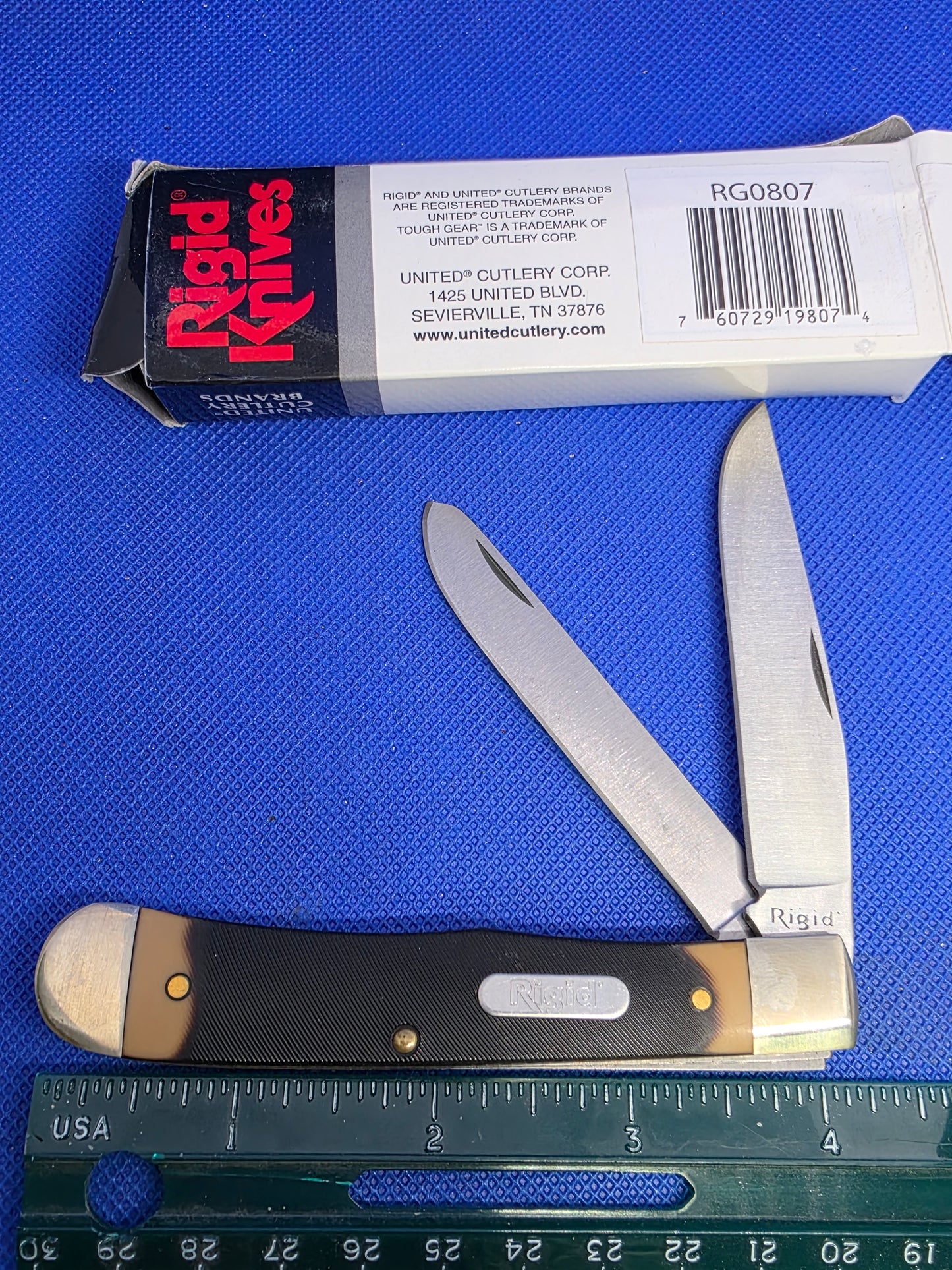 Rigid Trapper Sawcut Delrin Handles NIB RG0807 by United Cutlery