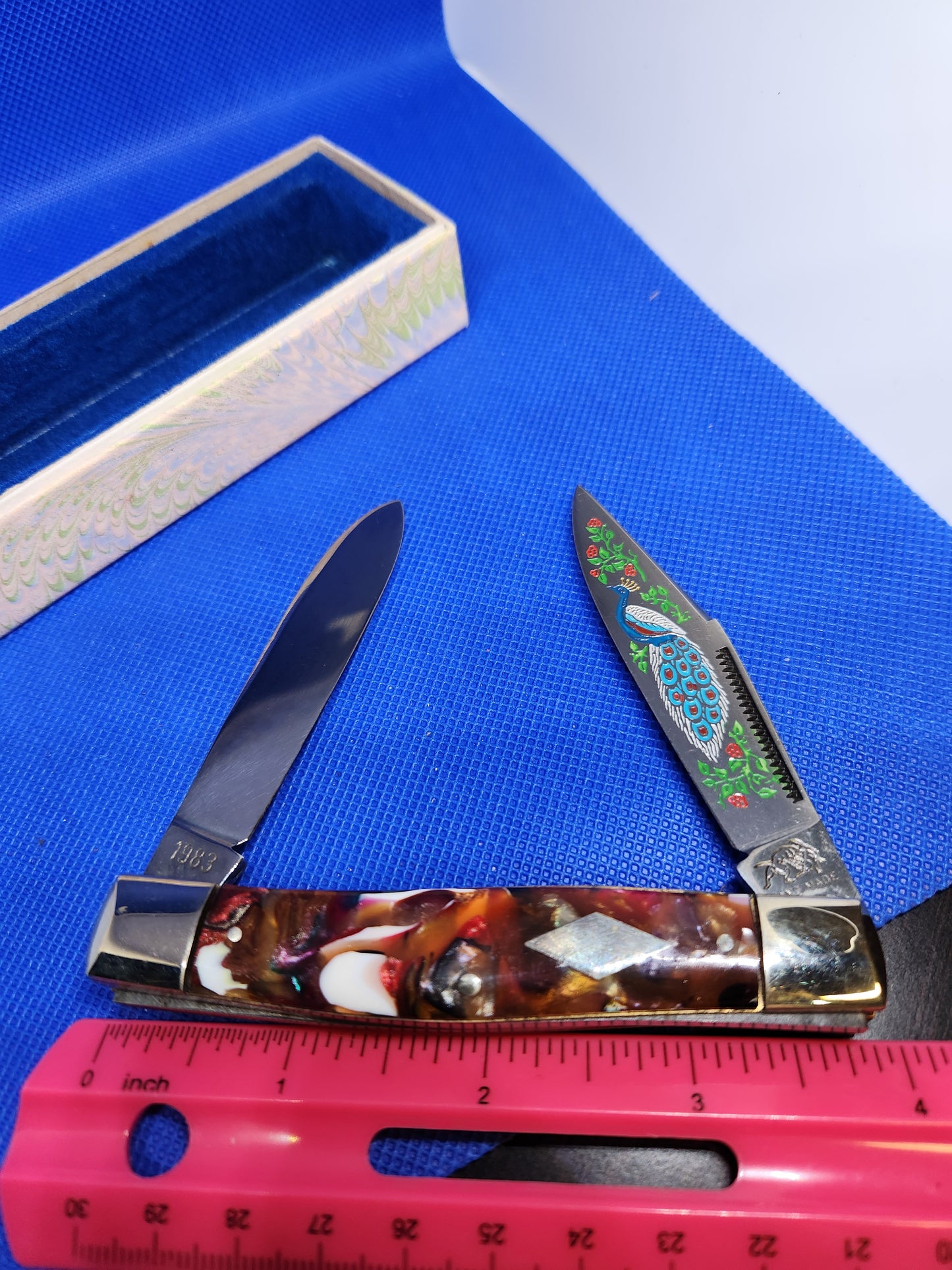 Bulldog Brand Moose 1983 end of day celluloid handles peacock etch.