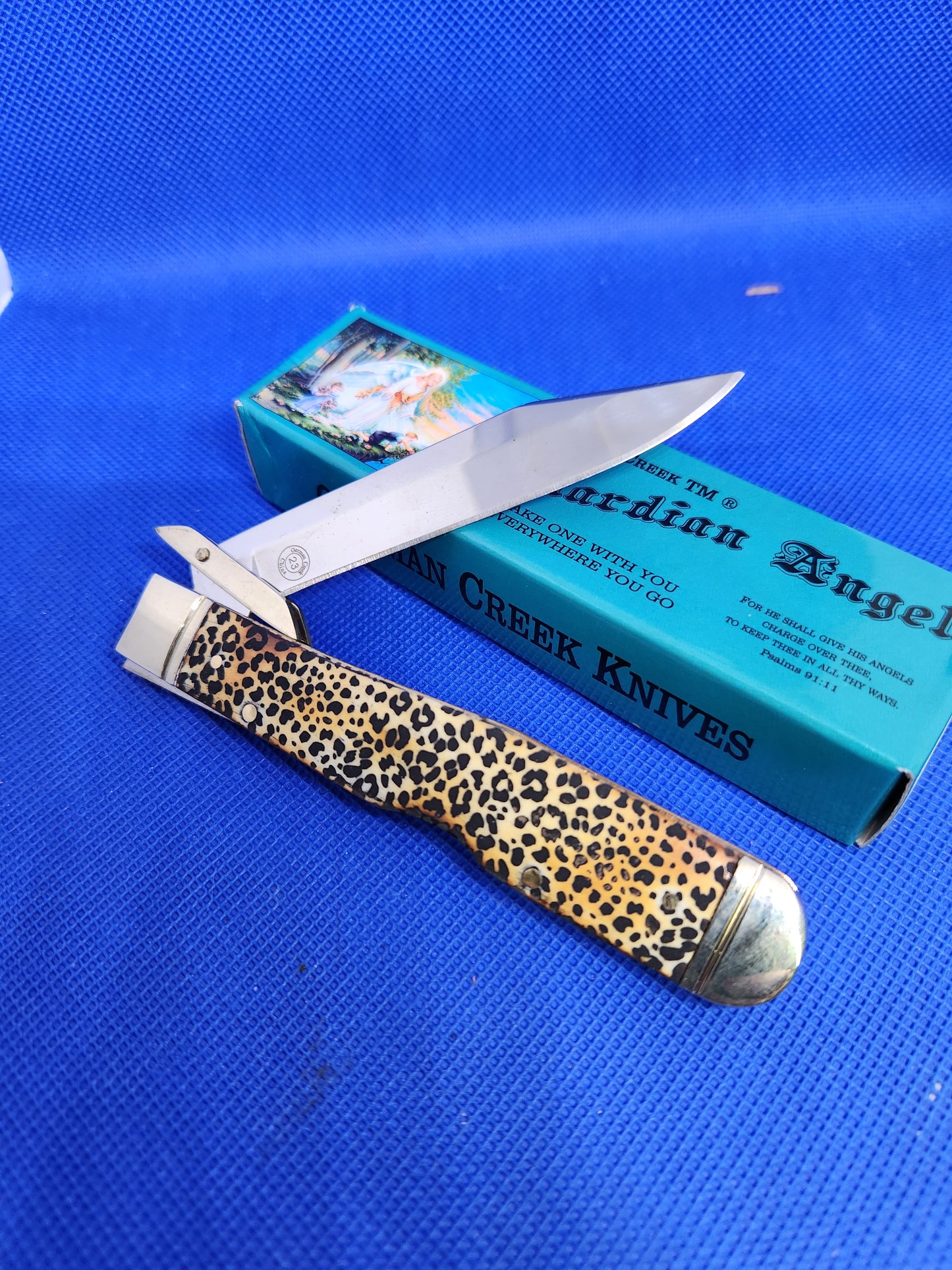 Guardian Angel Lock Back Cheetah Knife Burnt White Bone Handles Cheetah Etch 4 3/8" EM2567052WBN - CTH