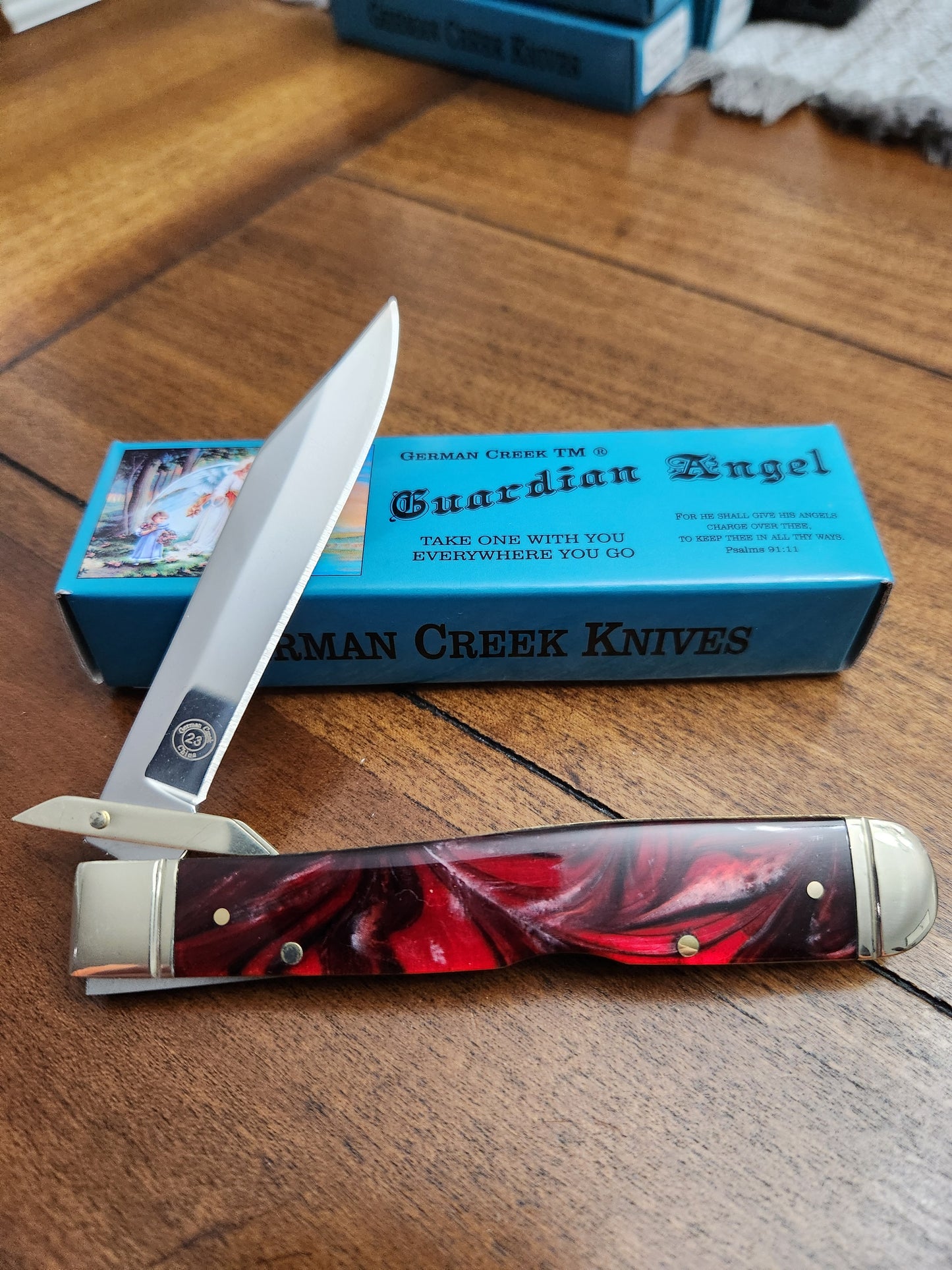 Guardian Angel Lock Back Cheetah Knife Red Pearl Handles 4 3/8" EM2567052CERD