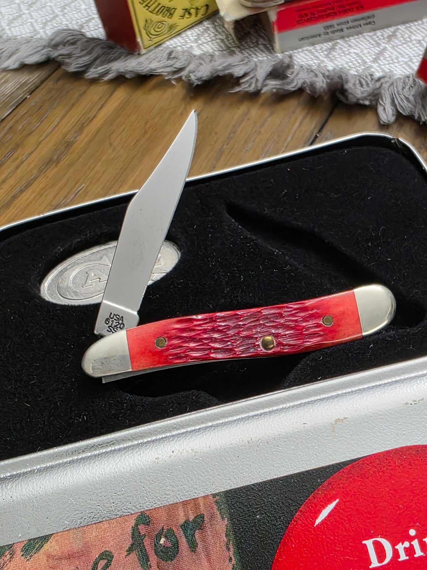 2002 Case XX Red Jig Bone Peanut 6120 Coca-Cola in the original tin