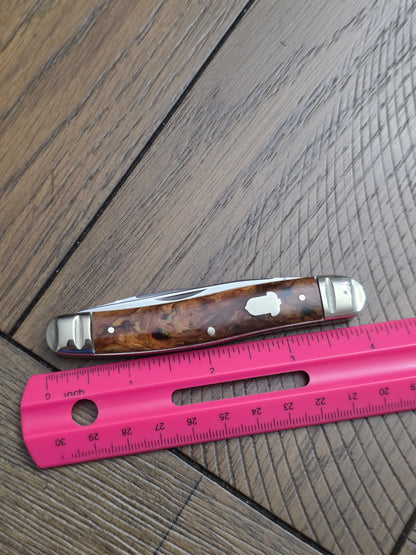 1991 A.G. Russell Muskrat with Butter & Molasses Handles - German Made - Acorn Shield