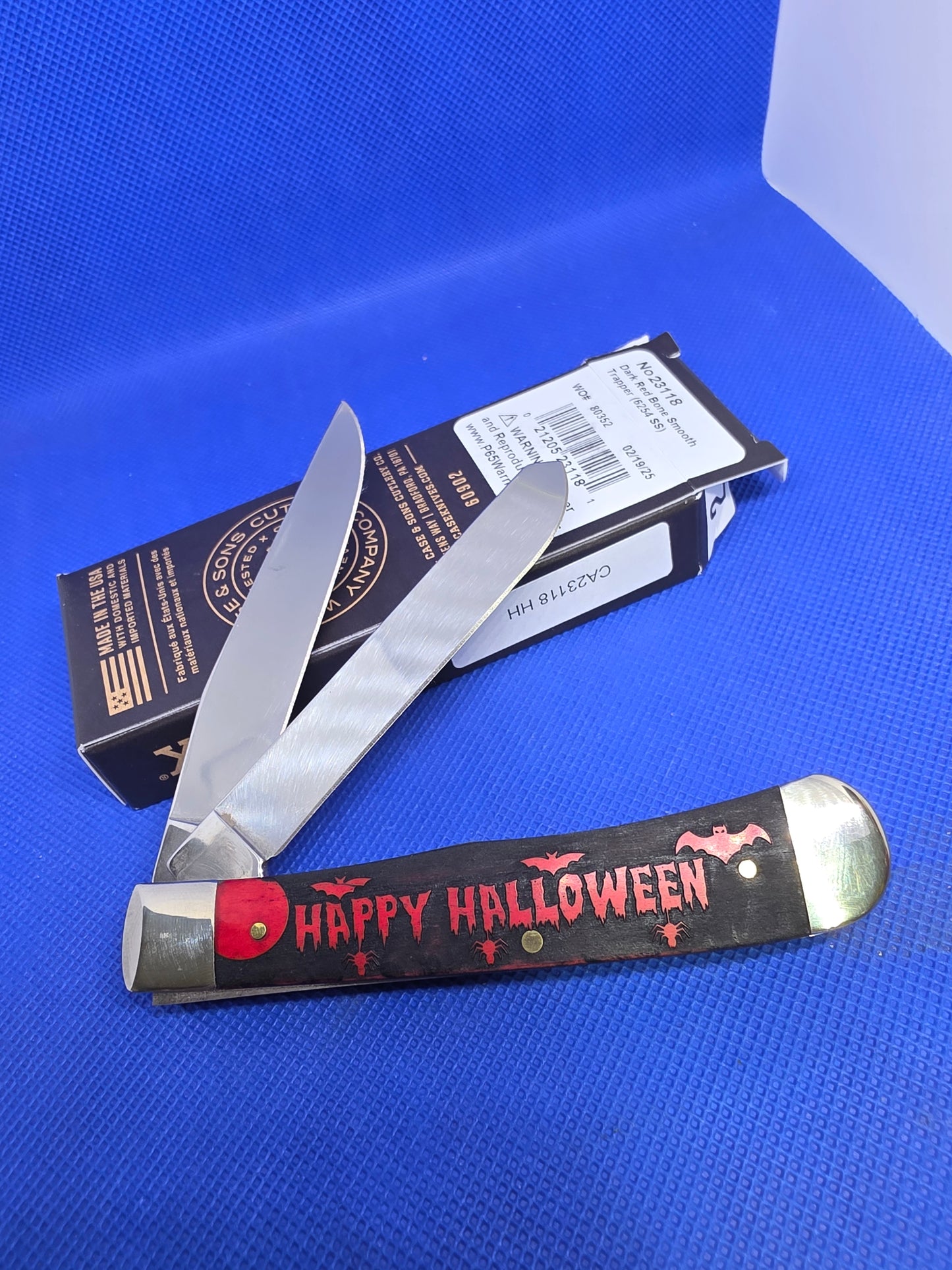 2025 Case XX Happy Halloween Trapper Red Smooth Bone SFO 23118HH with Carved Handles