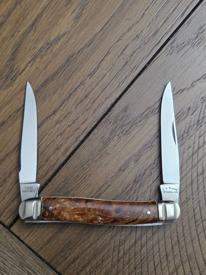 1991 A.G. Russell Muskrat with Butter & Molasses Handles - German Made - Acorn Shield