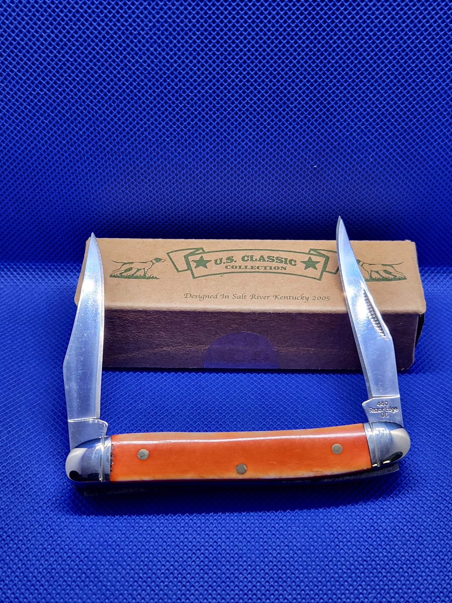 US Classic Smooth Orange Bone Muskrat knife EM2567017OR