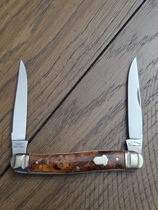 1991 A.G. Russell Muskrat with Butter & Molasses Handles - German Made - Acorn Shield