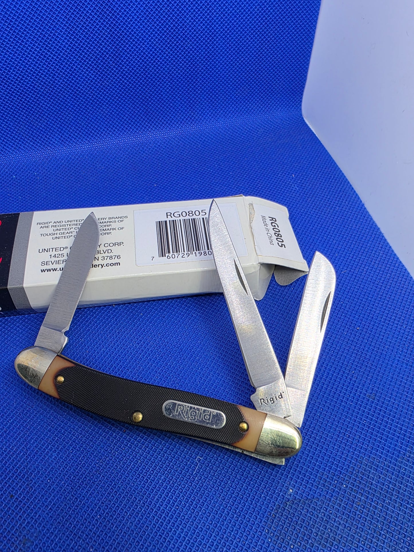 Rigid - Stockman 3.75" with Brown Sawcut Delrin Handles - RG805