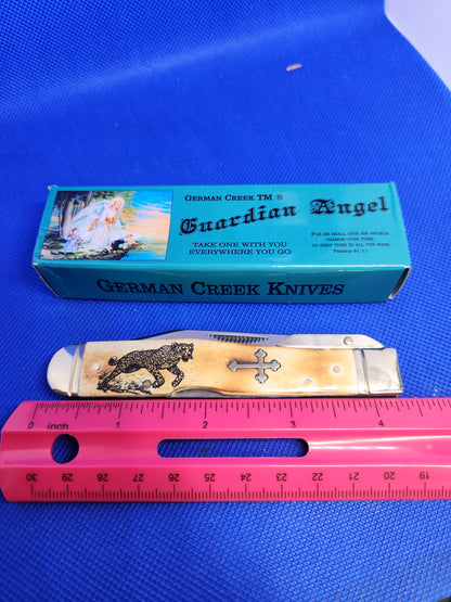 Guardian Angel Lock Back Cheetah Knife Burnt White Bone Handles Cheetah Etch 4 3/8" EM2567052WBN - CTH