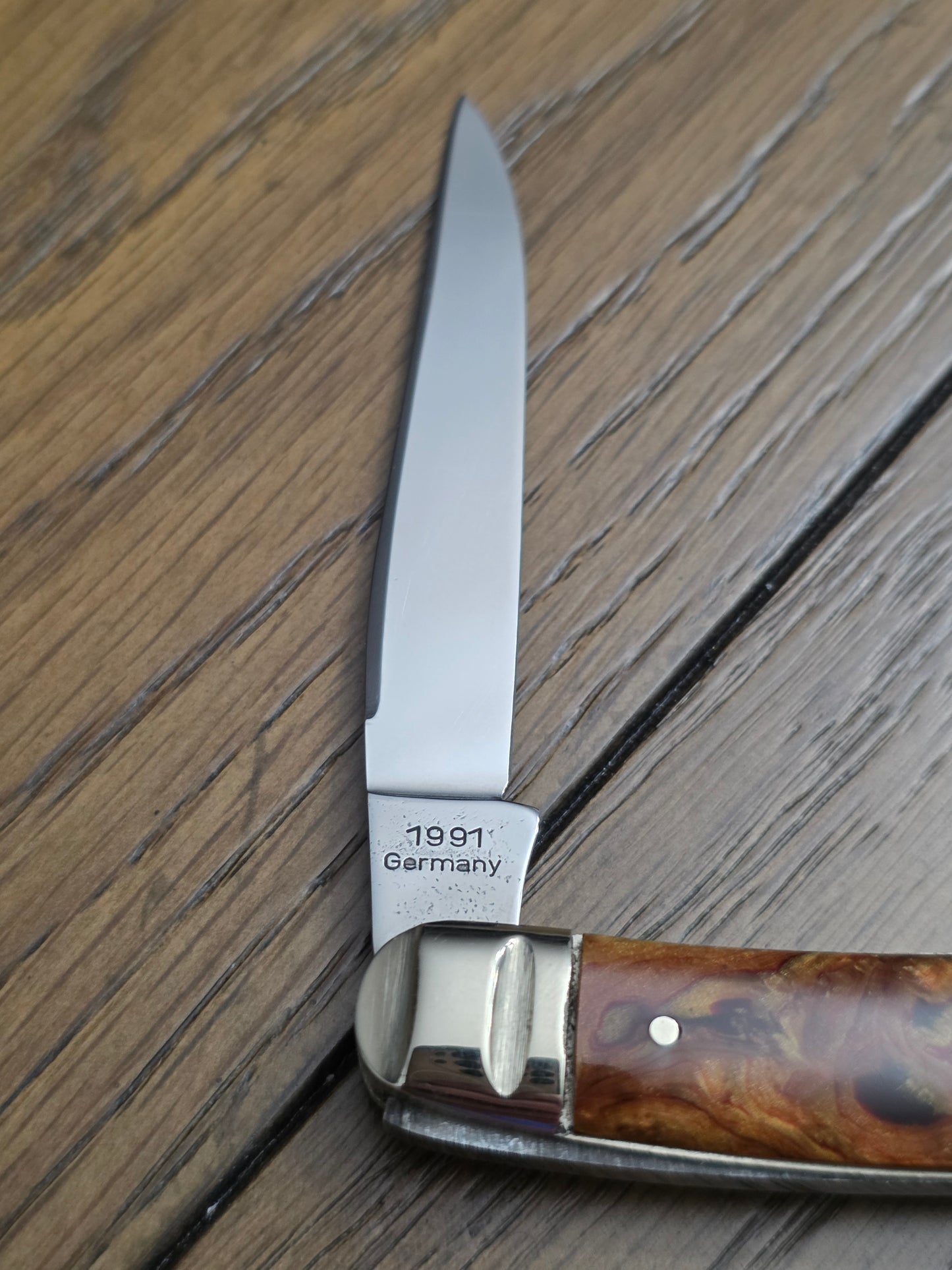 1991 A.G. Russell Muskrat with Butter & Molasses Handles - German Made - Acorn Shield