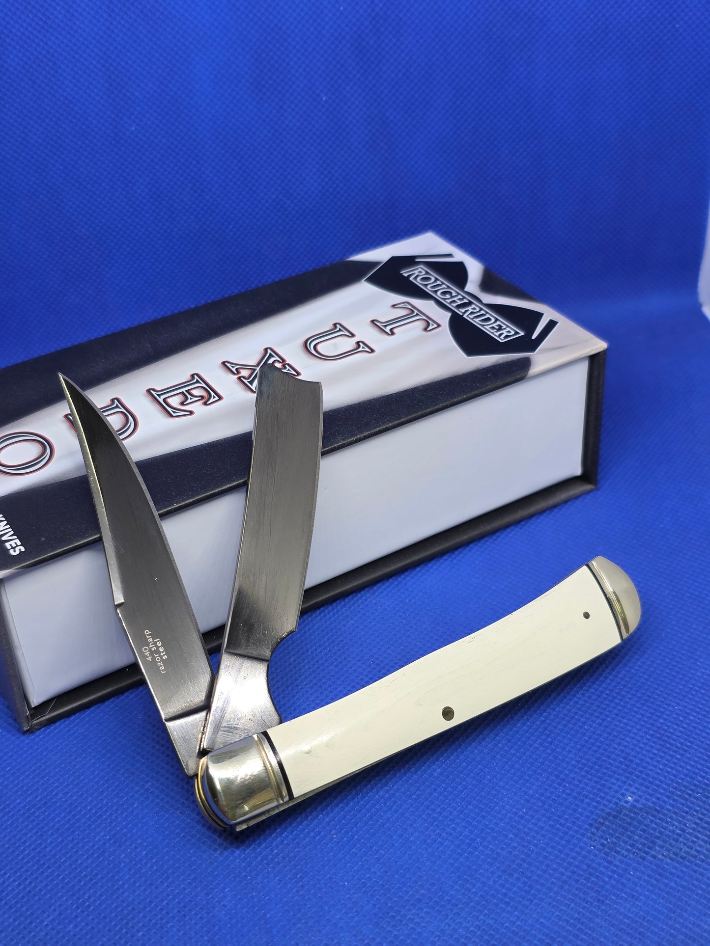 Rough Ryder - Tuxedo Razor Trapper - White Micarta with Black Liners - RR2667