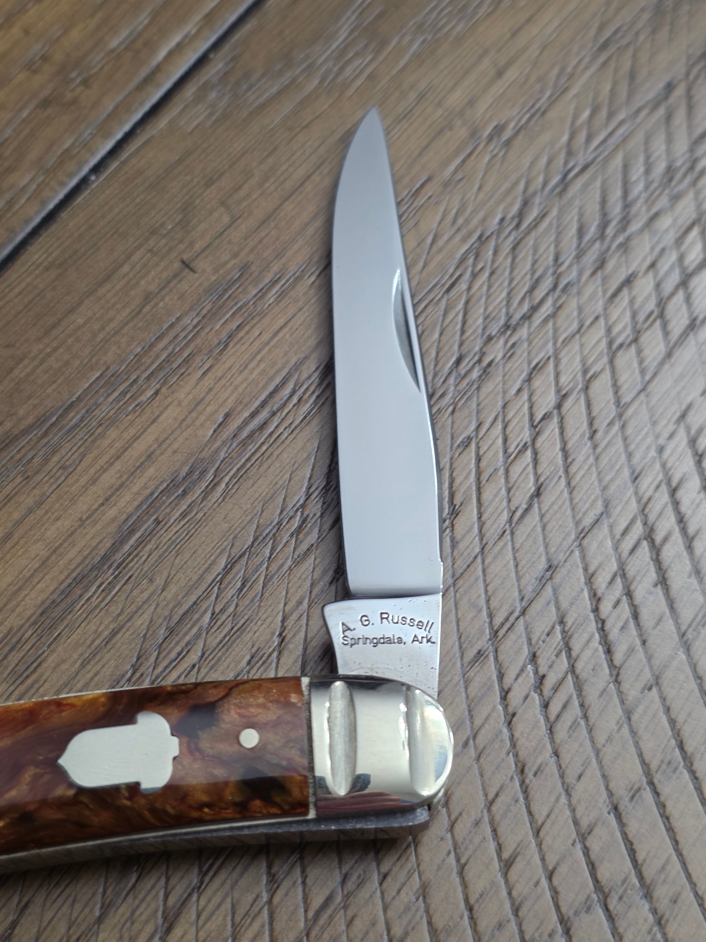 1991 A.G. Russell Muskrat with Butter & Molasses Handles - German Made - Acorn Shield