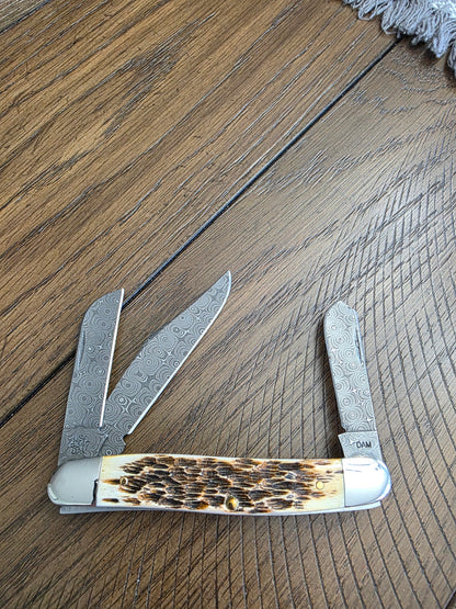 2017 Case XX Raindrop Damascus Burnt Amber Bone 6347DAM Medium Stockman