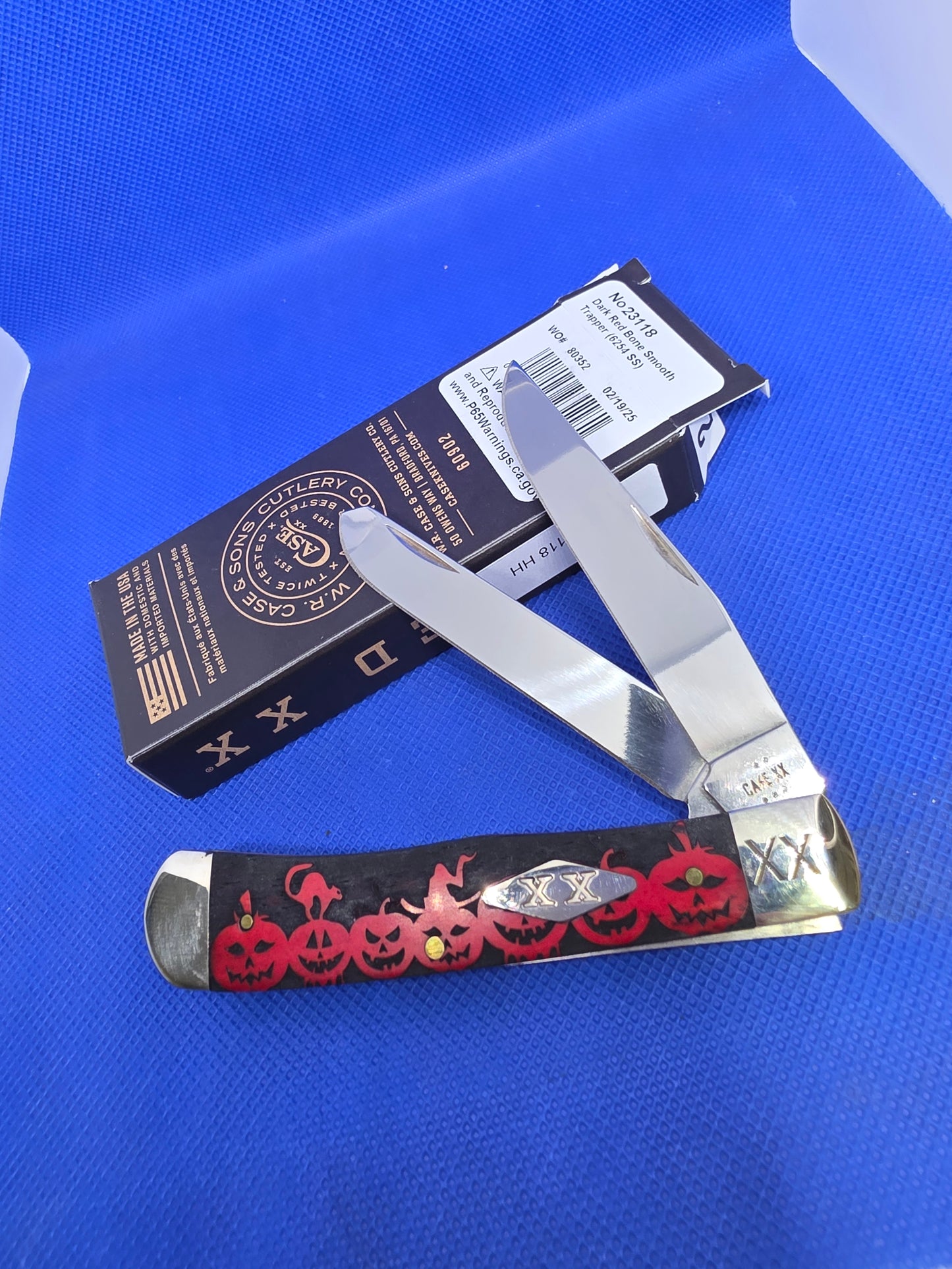 2025 Case XX Happy Halloween Trapper Red Smooth Bone SFO 23118HH with Carved Handles