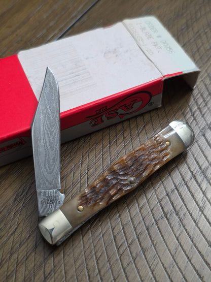 1989 Case XX ROG125 1/2 Brown Jig Bone with Damascus Swell Center Jack 00056