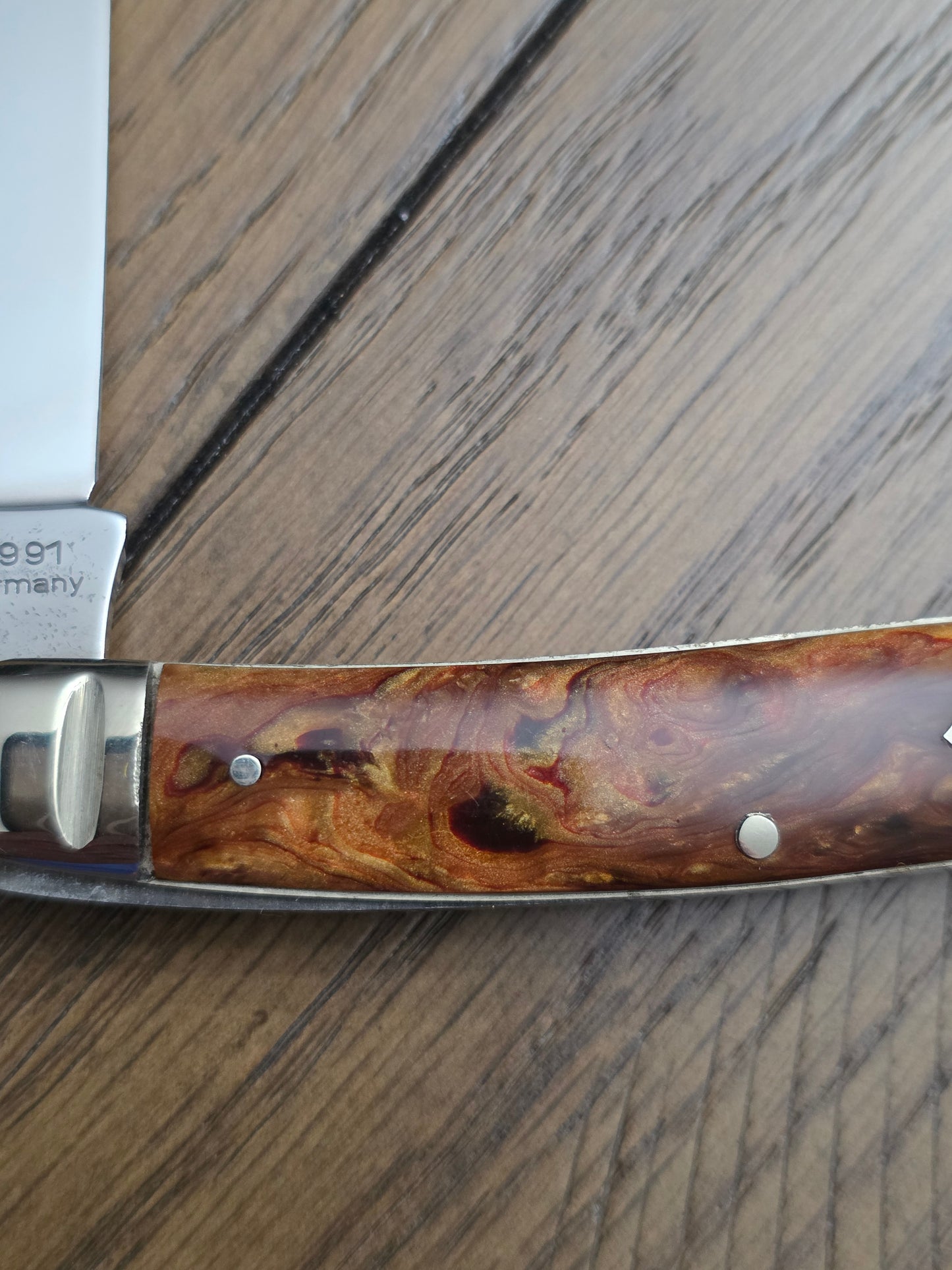 1991 A.G. Russell Muskrat with Butter & Molasses Handles - German Made - Acorn Shield